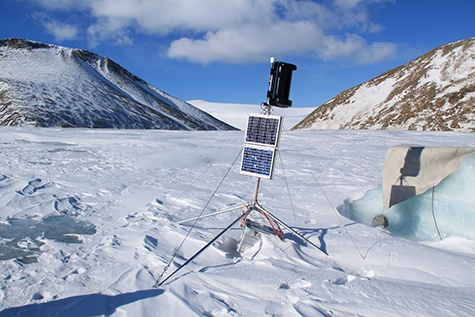 Enlarged view: An image showing the GNSS augmented with Solar panels buried in the snow